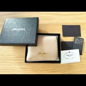 AUTHENTIC PRADA WALLET COMES WITH AUTHENTICITY CARD